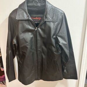 Vintage size Medium Black Leather Jacket with Classic Design and Glossy Finish‎